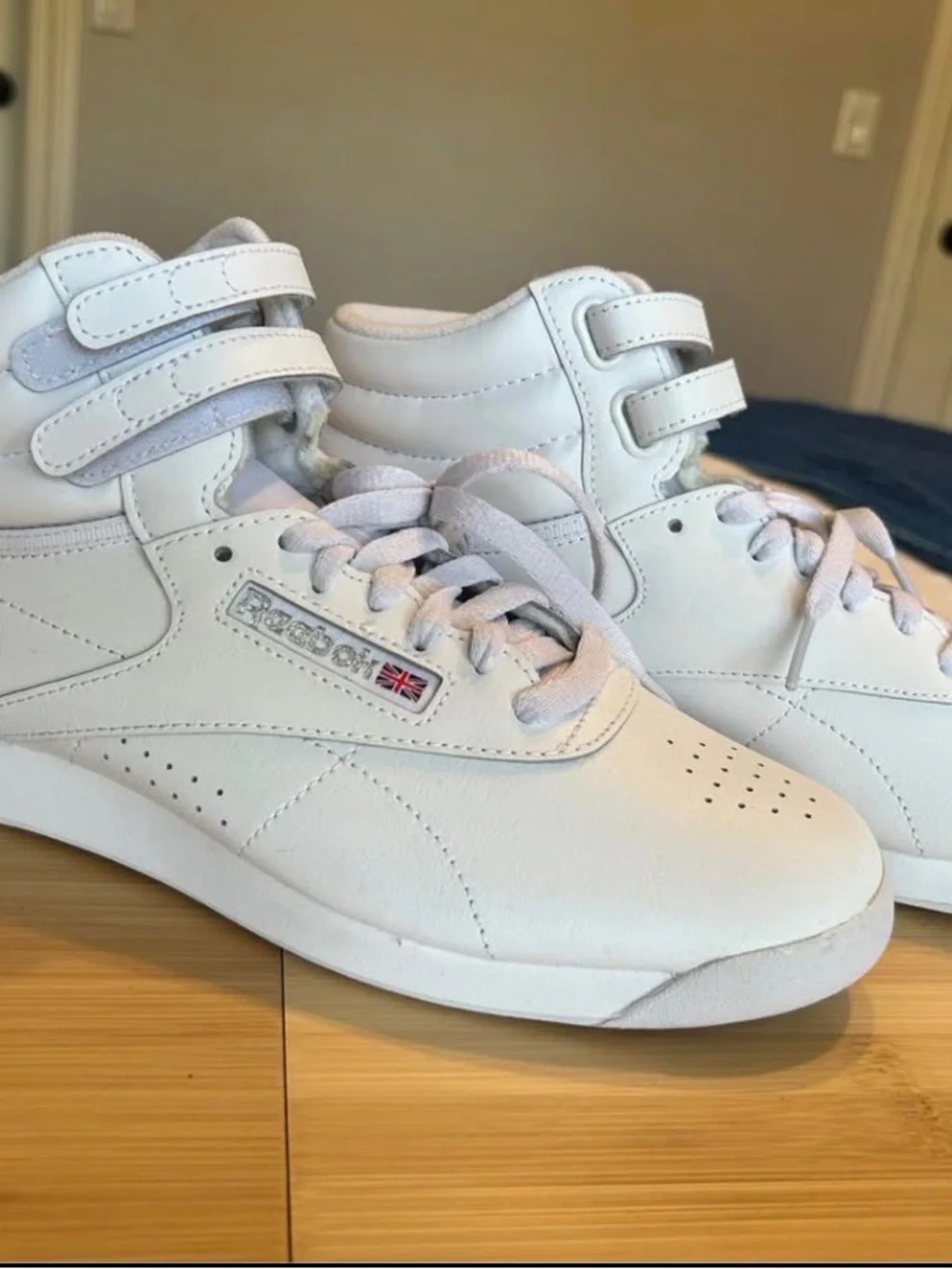 Reebok Women’s White Freestyle High-Top Sneakers